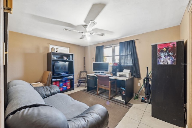 office with ceiling fan, baseboards, and tile patterned floors