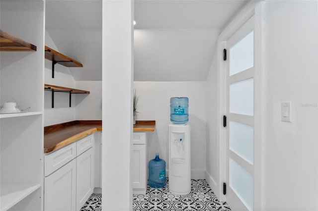 bathroom with lofted ceiling