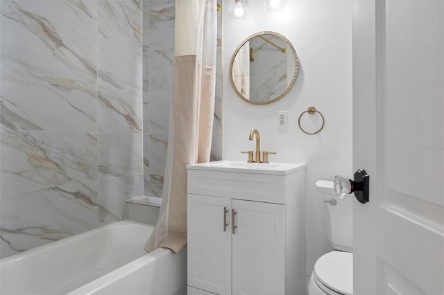 bathroom featuring shower / bath combination with curtain, vanity, and toilet