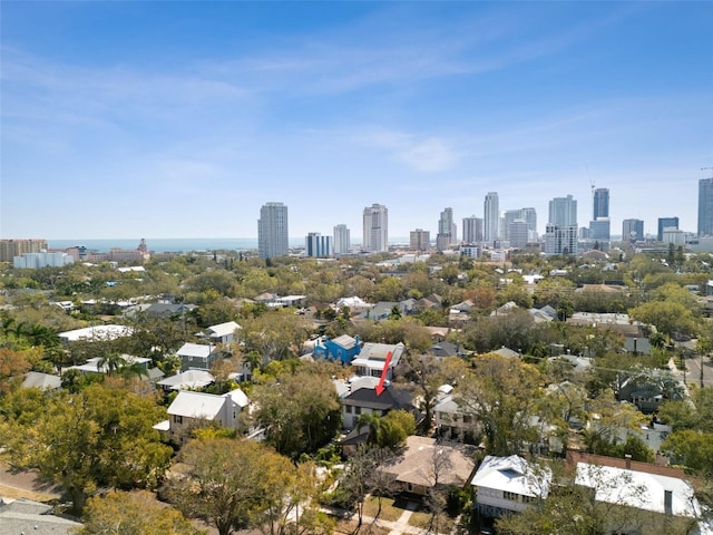 birds eye view of property featuring a city view