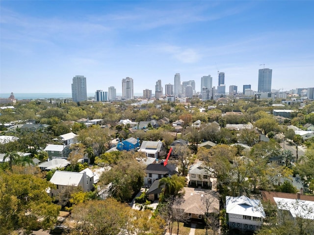 birds eye view of property with a view of city