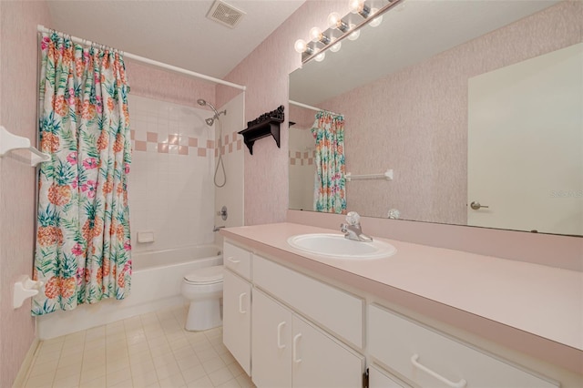 full bathroom with visible vents, toilet, shower / tub combo, vanity, and tile patterned flooring