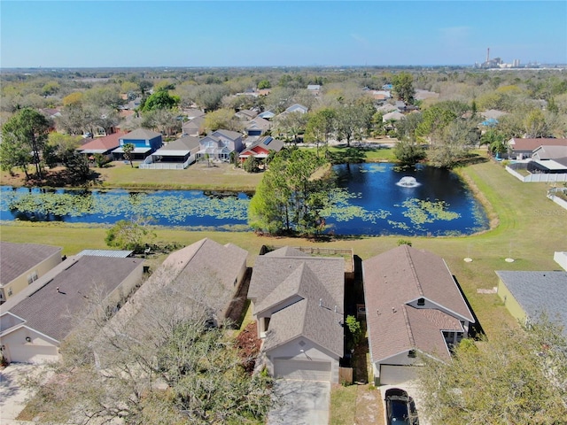 aerial view featuring a water view and a residential view