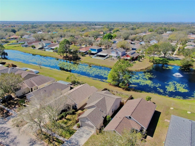 aerial view with a water view and a residential view
