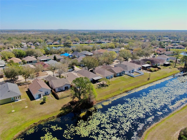 aerial view featuring a water view and a residential view