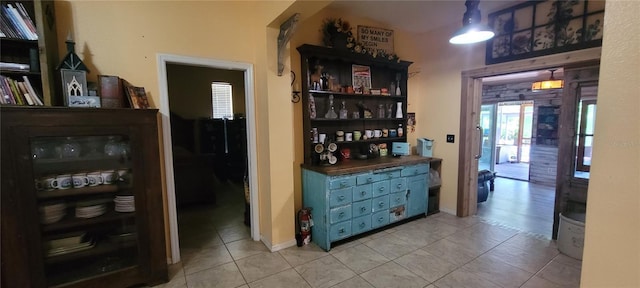 interior space featuring light tile patterned floors