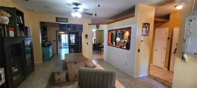 hallway featuring light tile patterned floors