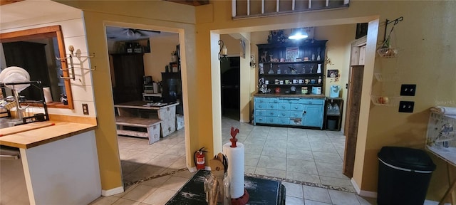 interior space featuring tile patterned flooring