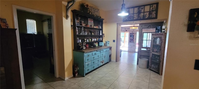 interior space with light tile patterned floors