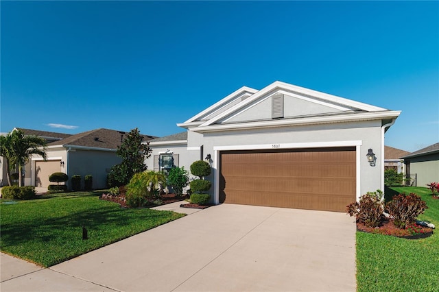 ranch-style house with a garage, a front yard, concrete driveway, and stucco siding