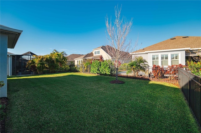 view of yard featuring a fenced backyard