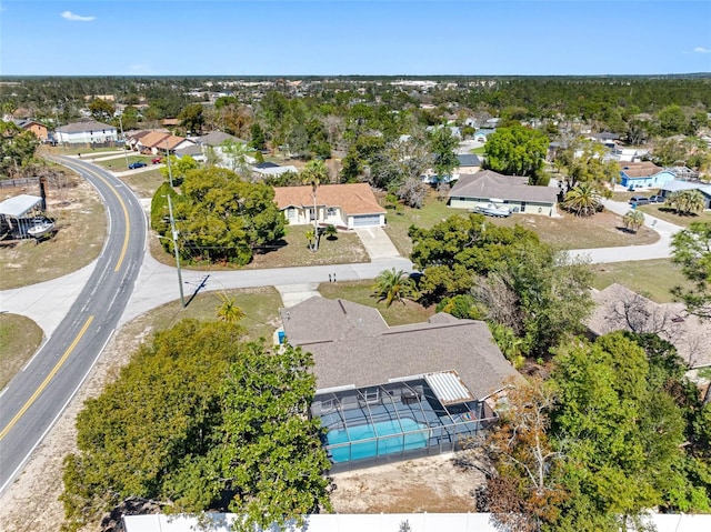 birds eye view of property with a residential view