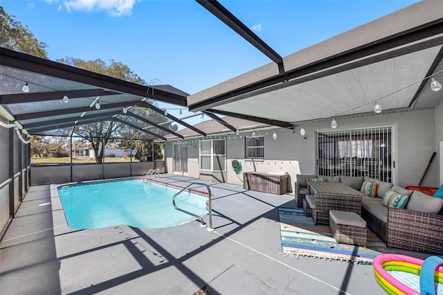 view of swimming pool featuring a fenced in pool, glass enclosure, outdoor lounge area, and a patio