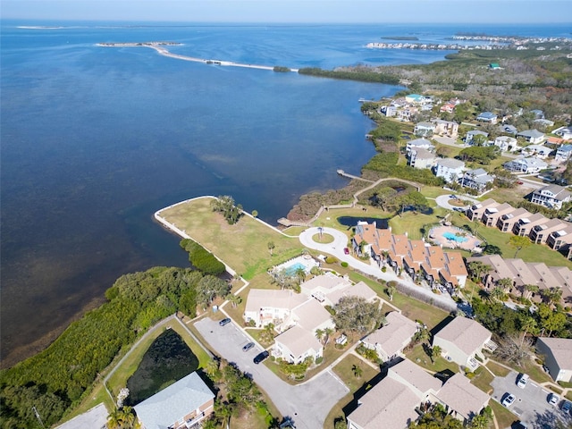 bird's eye view with a water view and a residential view