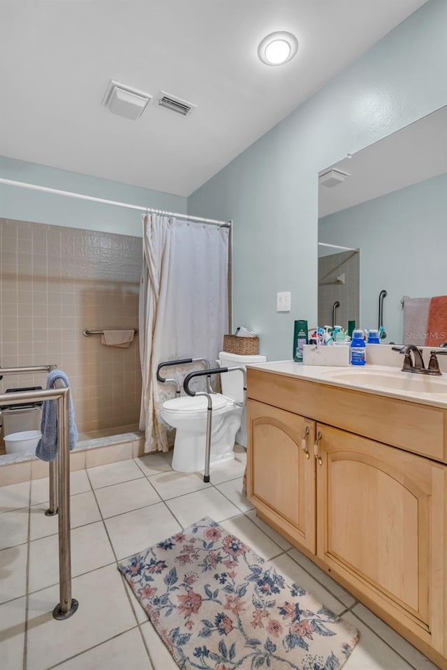 full bath featuring a shower with curtain, visible vents, toilet, vanity, and tile patterned flooring