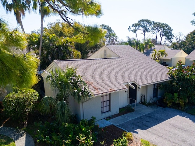 view of front of home featuring a shingled roof