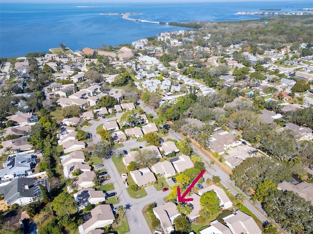 bird's eye view with a water view and a residential view