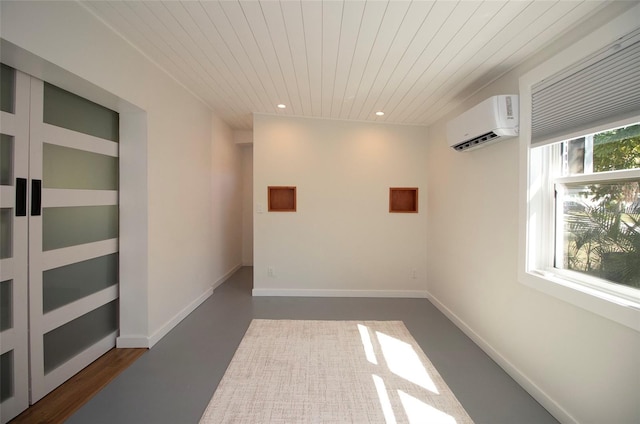 spare room featuring baseboards, a wall mounted AC, wood ceiling, and recessed lighting