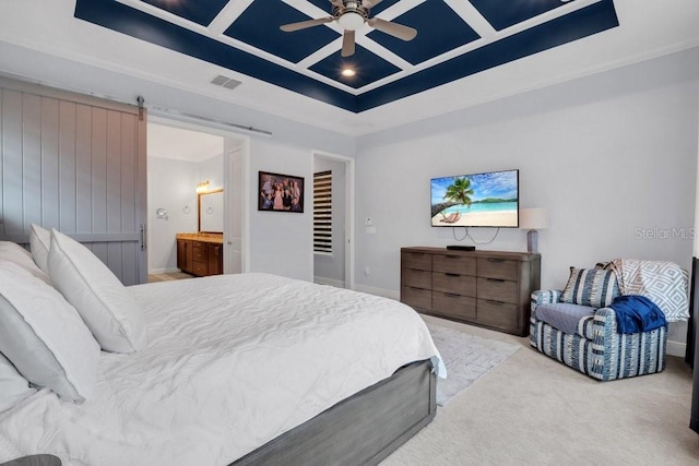 carpeted bedroom featuring ensuite bathroom, ceiling fan, a barn door, coffered ceiling, and visible vents