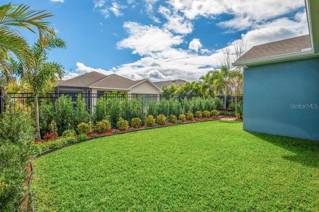 view of yard featuring a fenced backyard