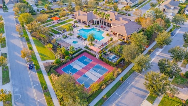 birds eye view of property with a residential view