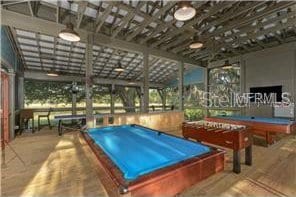 recreation room with wood finished floors