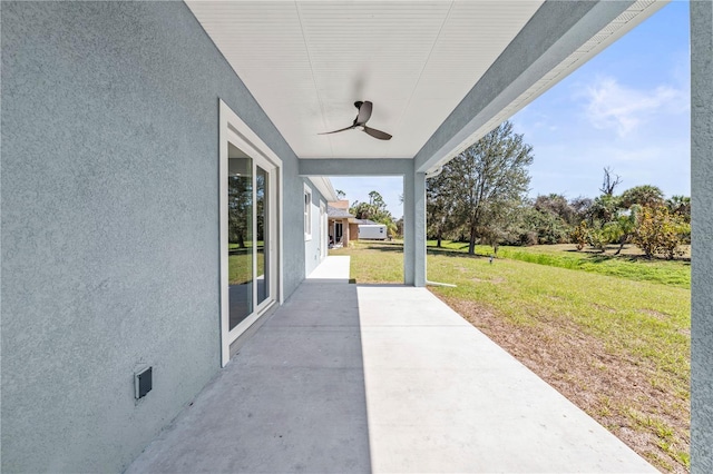 view of patio with ceiling fan