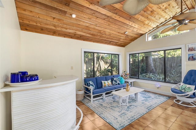 tiled living room featuring lofted ceiling, ceiling fan, and wood ceiling