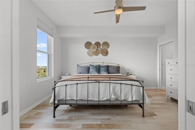 226 5th Ave N Unit 901, Saint Petersburg, FL 33701 - bedroom featuring light wood finished floors, a ceiling fan, and baseboards