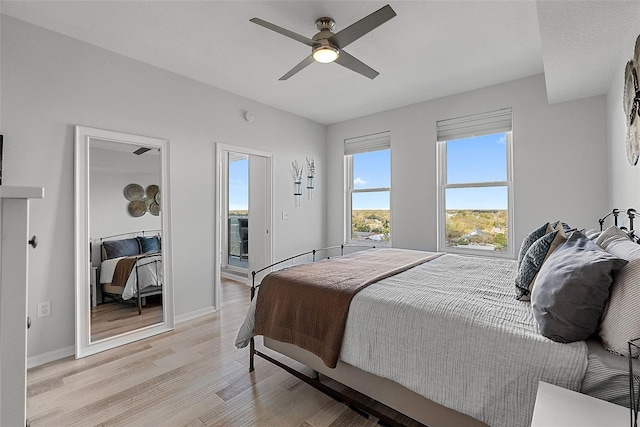 226 5th Ave N Unit 901, Saint Petersburg, FL 33701 - bedroom with light wood-style floors, ceiling fan, and baseboards