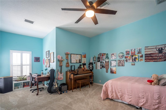 bedroom with visible vents, a textured ceiling, and carpet flooring