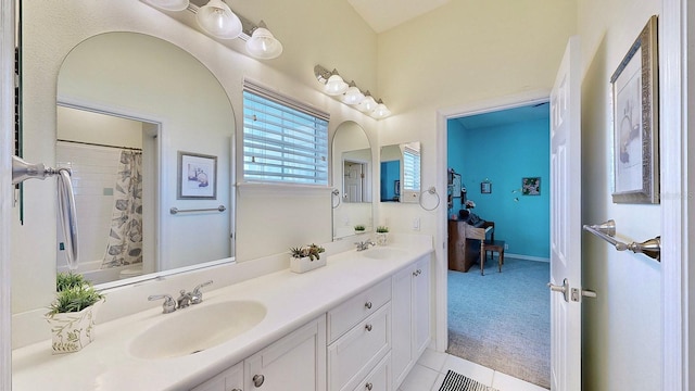 bathroom featuring double vanity and a sink