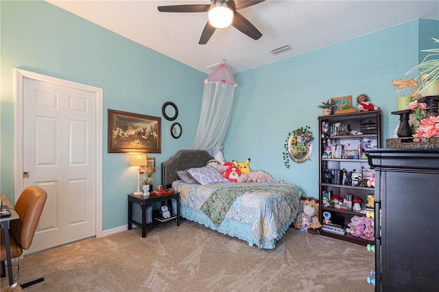 bedroom with carpet flooring, visible vents, and a ceiling fan