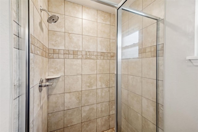 bathroom featuring a stall shower