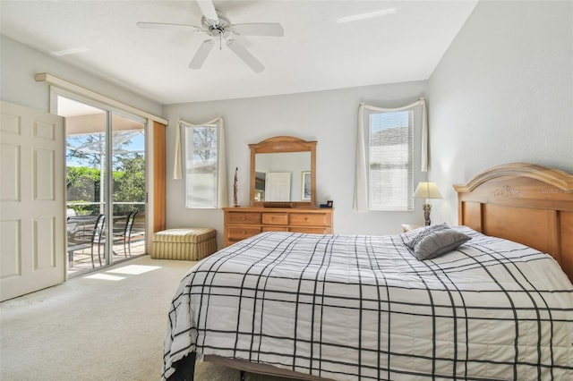 carpeted bedroom with a ceiling fan and access to exterior