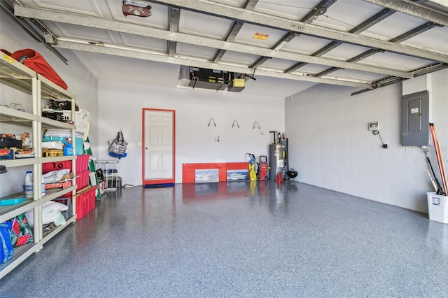 garage featuring electric panel, a garage door opener, and electric water heater