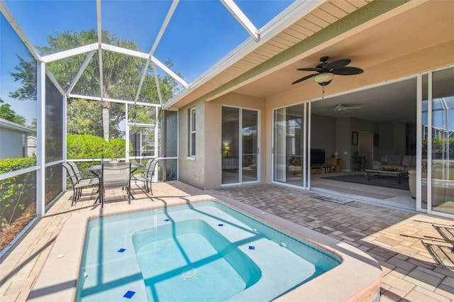 4410 Sawgrass Dr, Palm Harbor, FL 34685 - swimming pool featuring a patio area, glass enclosure, and ceiling fan