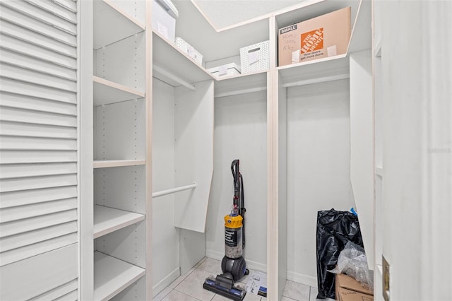 walk in closet featuring tile patterned floors