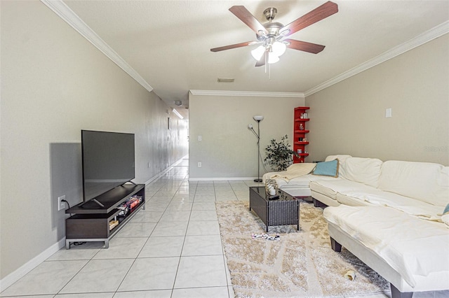 living room with light tile patterned floors, visible vents, ornamental molding, ceiling fan, and baseboards