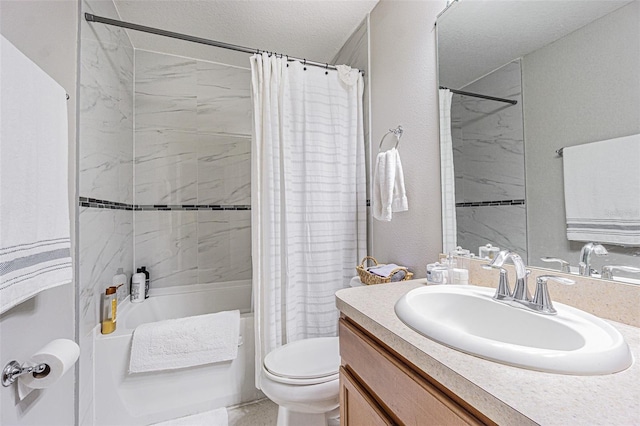 full bathroom featuring toilet, a textured ceiling, shower / bath combo, and vanity