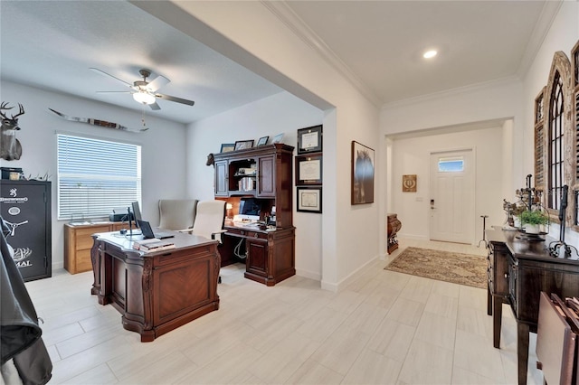 home office with ceiling fan, ornamental molding, and baseboards