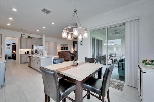 dining space featuring recessed lighting, visible vents, and ornamental molding