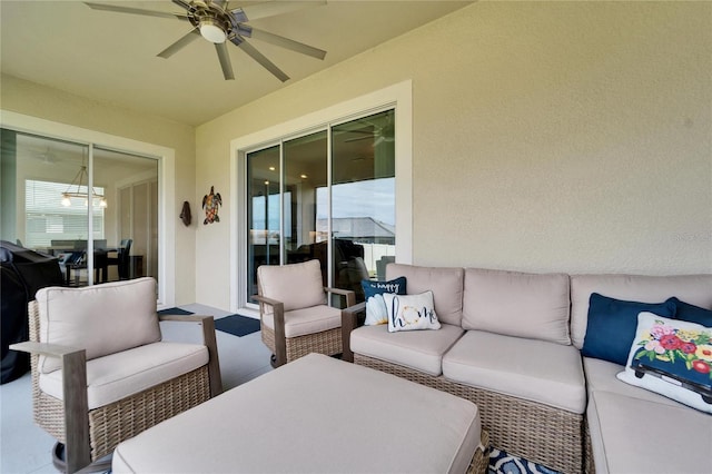 view of patio / terrace with ceiling fan and an outdoor hangout area