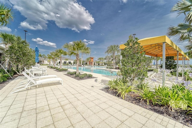pool featuring a patio area