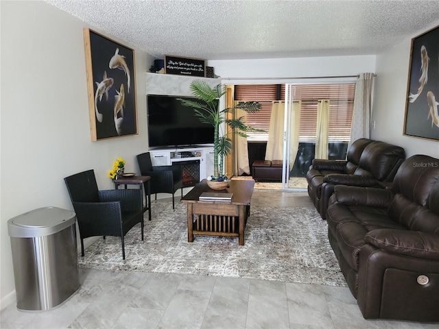 living room with a textured ceiling