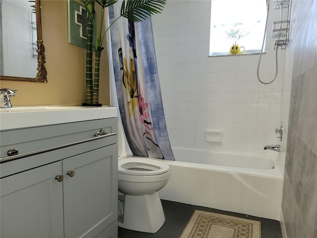 bathroom with shower / bath combination with curtain, vanity, and toilet