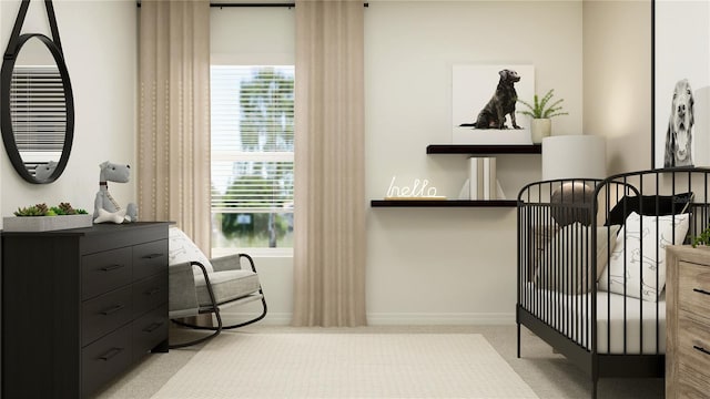 bedroom featuring light carpet and baseboards