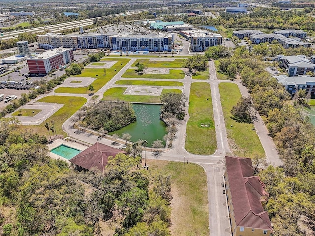 bird's eye view with a water view