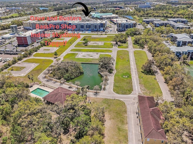drone / aerial view with a water view