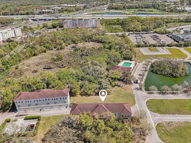 drone / aerial view with a water view